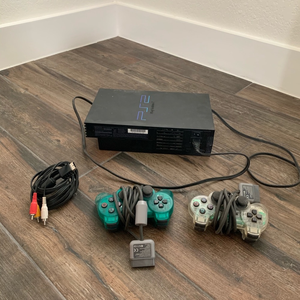 COPY - PS2 system and 20 plus games.